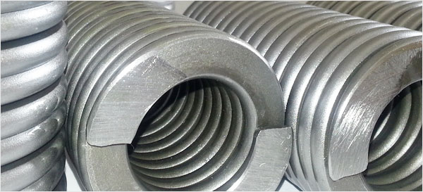 Helical disc spring